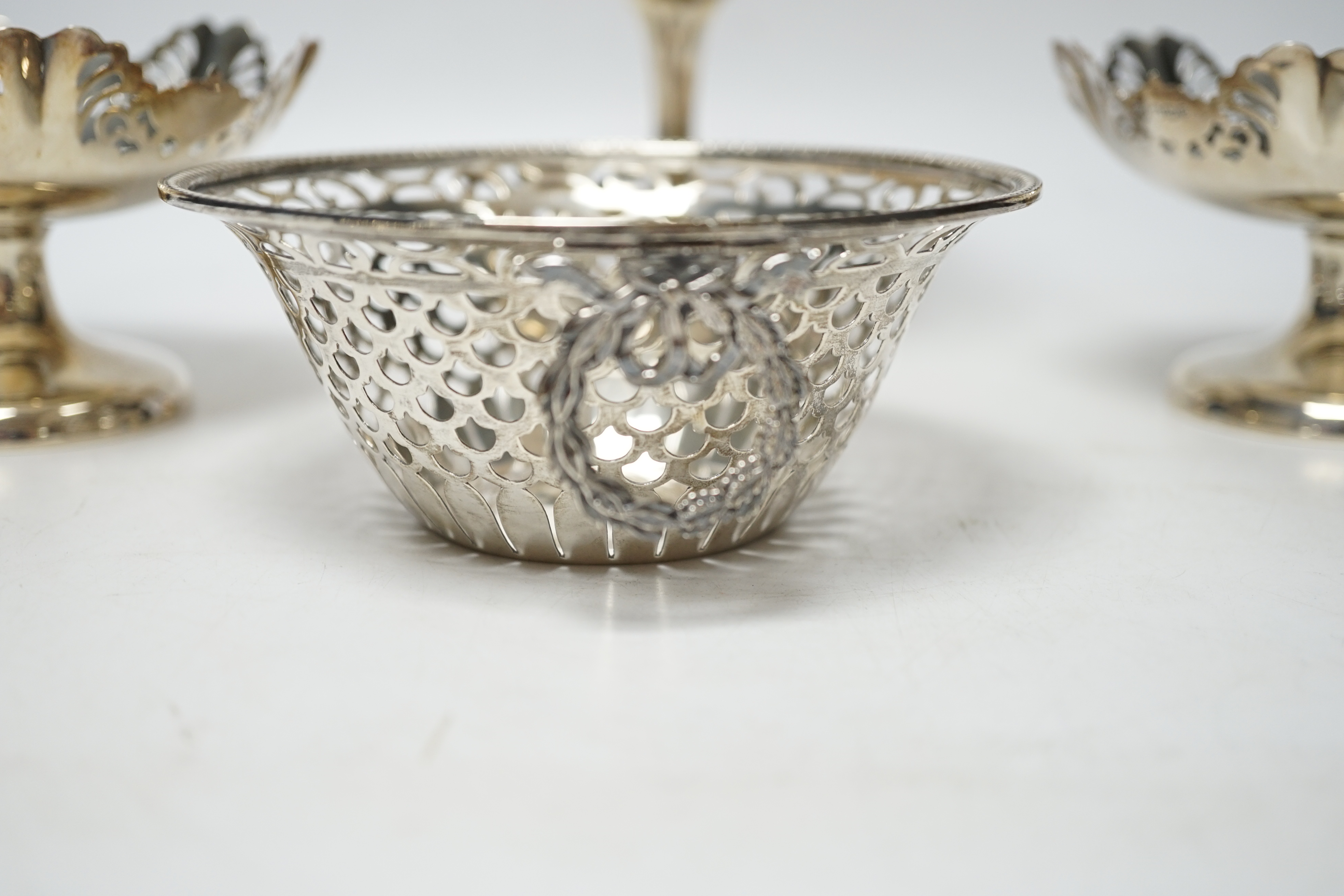 A pair of George VI pierced silver pedestal bon bon dishes, Viners Ltd, Sheffield, 1947, 11.7cm and three other assorted silver bonbon dishes, one with ring handles.